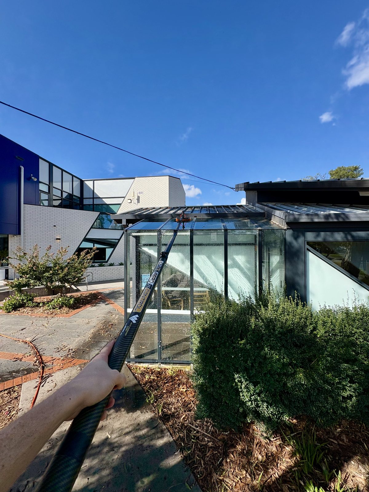 Commercial conservatory — water-fed pole